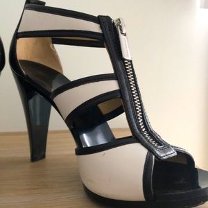 Black and white high heel Michael Kors with front zipper